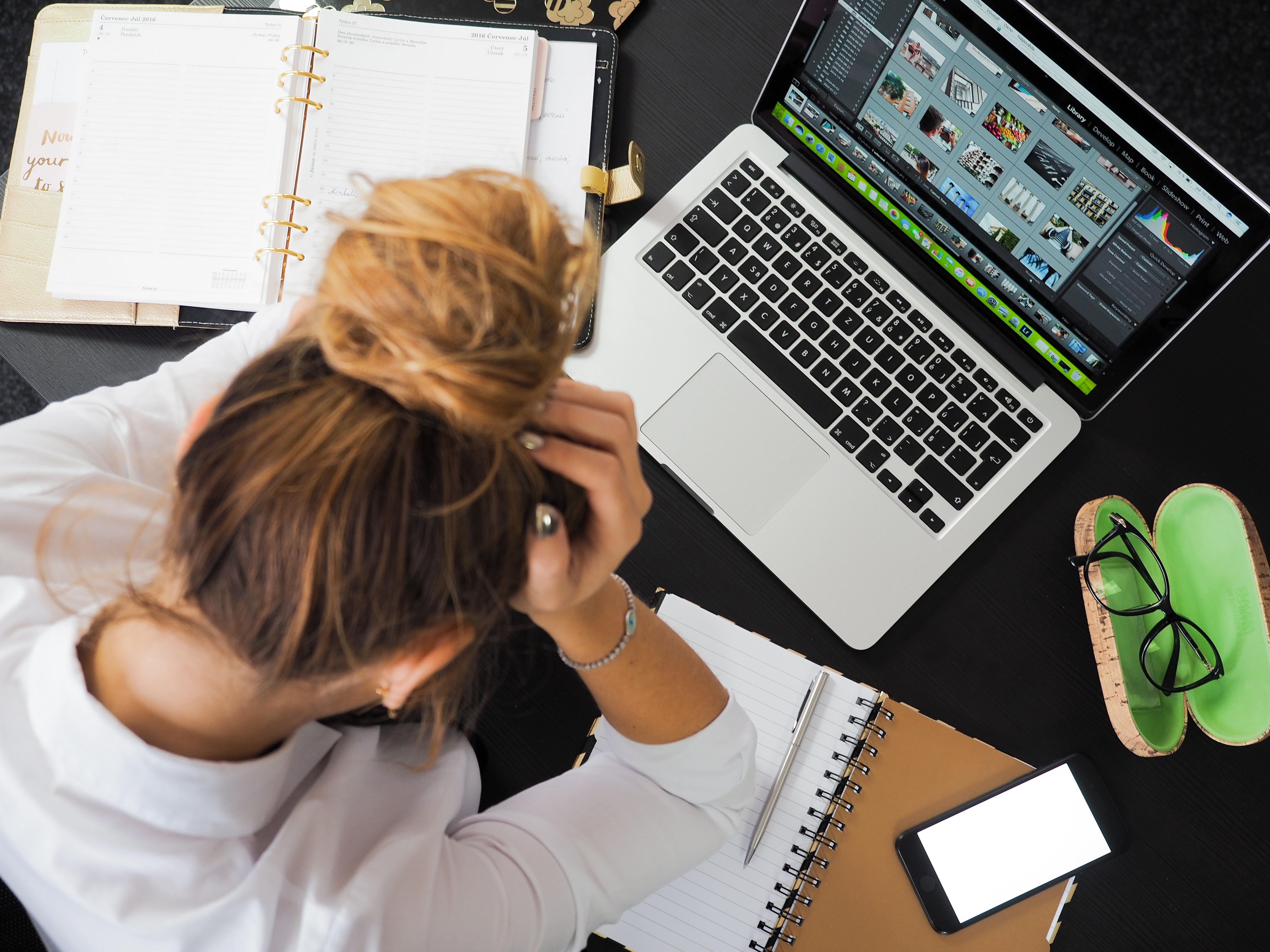 business professional frustrated at desk